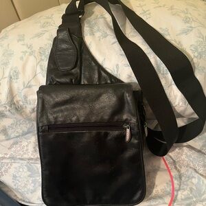Black Leather women’s travelon anti theft crossbody sling bag purse
Adjustable